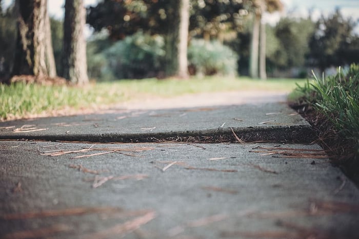 raising sunken sidewalk blocks 