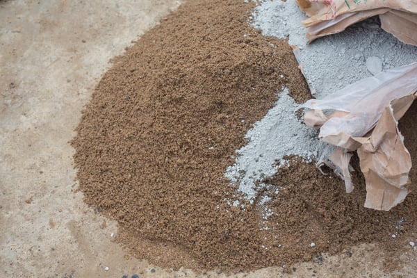 construction-technicians-are-mixing-cement-stone-sand-construction (1)