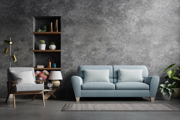 loft-style-house-with-armchair-sofa-accessories-room-concrete-wall-floor